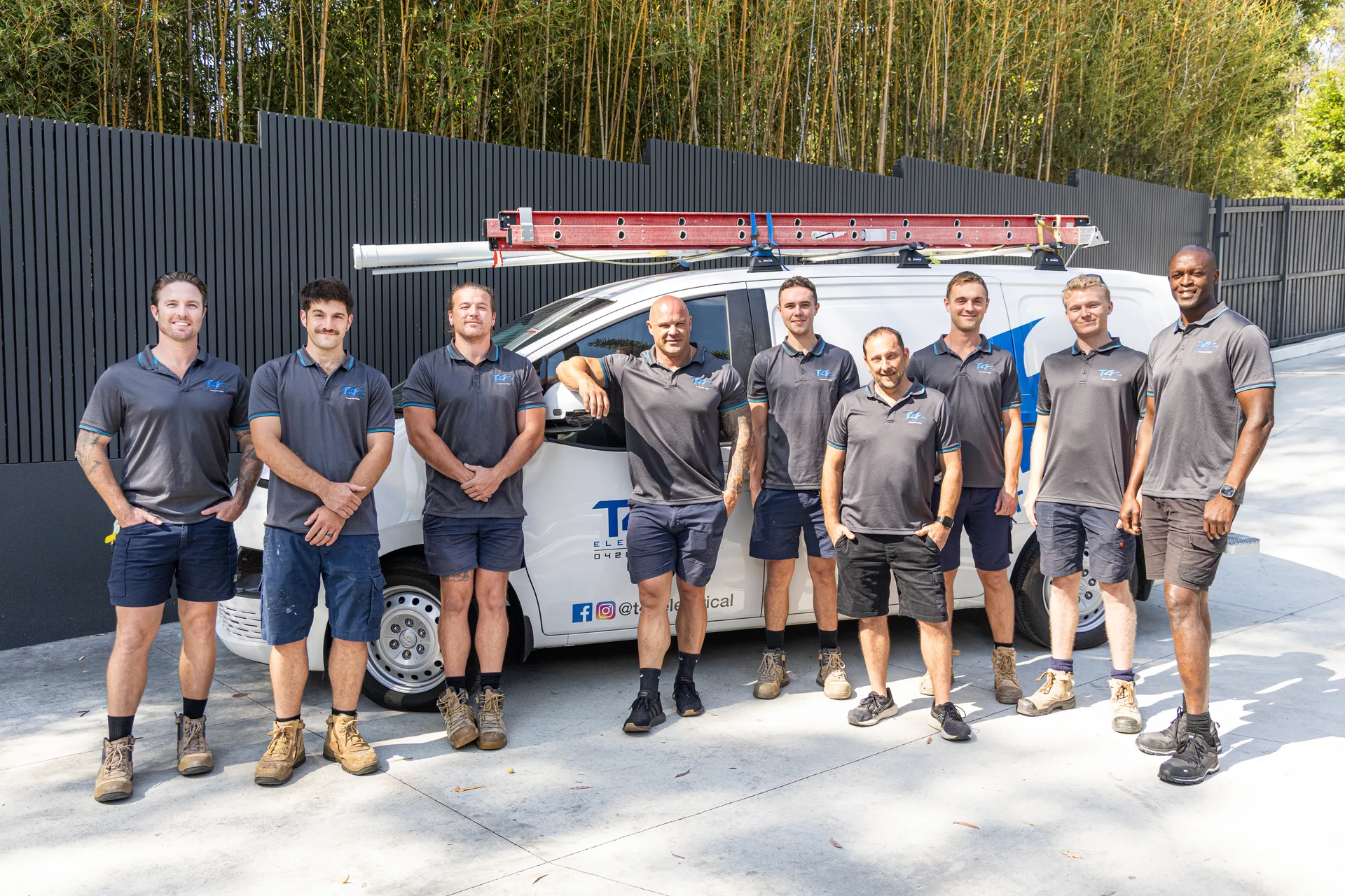 The Family Electrician Benowa team with a service van